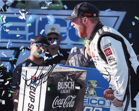 Signed 8x10 photo of Tyler Reddick celebrating his 2024 Talladega victory in victory lane with confetti falling over his #45 Jordan Jumpman car. Includes Certificate of Authenticity (COA), ideal for collectors.
