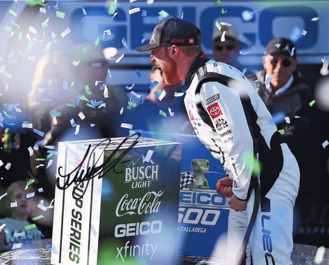 Celebrate Tyler Reddick's thrilling 2024 Talladega victory with this autographed 8x10 photo. The image captures the confetti-filled victory lane moment, signed and with a COA.