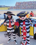 Autographed 2024 Tyler Reddick #45 McDonald's Racing Hamburglars Pit Road photo from the Homestead race, signed by Reddick, with Certificate of Authenticity (COA) for guaranteed authenticity.