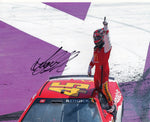 8x10 inch signed photo of Tyler Reddick celebrating his Michigan race win with his #45 McDonald's Toyota, a must-have for NASCAR fans, complete with COA for authenticity.