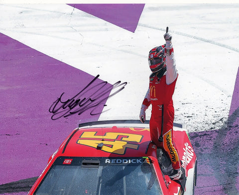 8x10 inch signed photo of Tyler Reddick celebrating his Michigan race win with his #45 McDonald's Toyota, a must-have for NASCAR fans, complete with COA for authenticity.