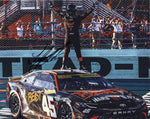 Autographed 2024 Tyler Reddick 8x10 photo of his #45 Monster Energy Toyota celebrating the Homestead Playoff win. A detailed NASCAR collectible and perfect gift. Includes COA. We are always here to help with any questions about your racing memorabilia or Tyler Reddick collection.