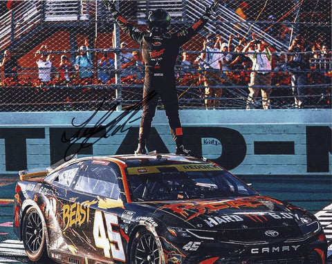 Autographed 2024 Tyler Reddick 8x10 photo of his #45 Monster Energy Toyota celebrating the Homestead Playoff win. A detailed NASCAR collectible and perfect gift. Includes COA. We are always here to help with any questions about your racing memorabilia or Tyler Reddick collection.