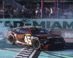 Exclusive 8x10 inch glossy photo of Tyler Reddick’s #45 The Beast Racing celebrating his 2024 Homestead Playoff win with a victory burnout. Signed by Reddick, complete with COA for guaranteed authenticity.