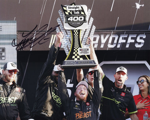 Signed photo of Tyler Reddick’s #45 The Beast Racing Homestead Playoff victory lane trophy moment from 2024, a must-have for NASCAR fans and collectors, with COA for authenticity.