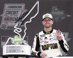 This autographed 8x10 photo features William Byron holding the trophy after his 2024 COTA race win. Signed and authenticated with COA. Perfect NASCAR collectible.