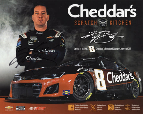 Signed 8x10 glossy photo of Kyle Busch #8 Cheddar’s Camaro Official Hero Card from Richard Childress Racing. A vibrant NASCAR collectible featuring Kyle Busch in action with COA included.
