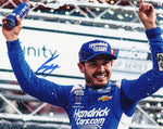 Autographed 2025 8x10 photo of Kyle Larson celebrating his Bristol win in the #5 Hendrick Cars Chevrolet. Signed in blue ink and perfect for any NASCAR collector or fan.