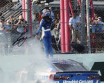 Autographed 8x10 photo of Kyle Larson celebrating his 2025 Homestead-Miami win in the #5 Hendrick Cars Chevrolet. A vibrant NASCAR collectible perfect for fans and display.
