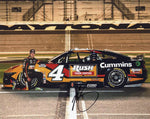 Signed 8x10 glossy NASCAR photo of Noah Gragson #4 Rush Truck Centers Daytona 500 car in a pit road pose. A vivid collectible perfect for fans and a great gift idea for racing lovers.