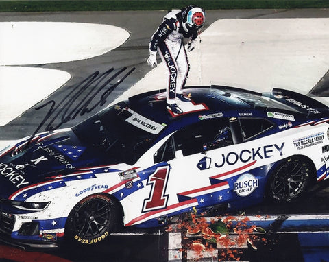 Autographed 2025 Ross Chastain NASCAR photo showing the #1 Jockey Patriotic Salutes car during the Coca-Cola 600 victory celebration. Great gift for motorsports fans and memorabilia collectors.