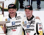 Rare signed 8x10 photo of Dale Earnhardt Jr. at the 2001 Rolex 24 Hours of Daytona, celebrating a 2nd place finish with his father. Includes COA for authenticity.