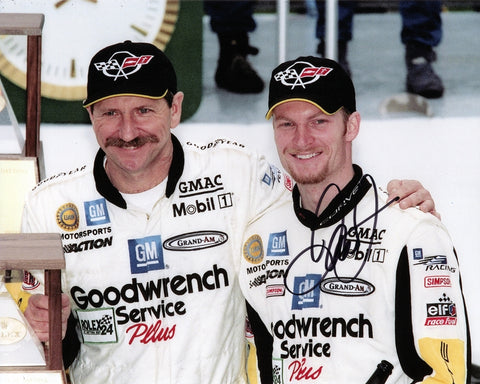 Rare signed 8x10 photo of Dale Earnhardt Jr. at the 2001 Rolex 24 Hours of Daytona, celebrating a 2nd place finish with his father. Includes COA for authenticity.