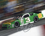 Signed 8x10 glossy photo of Dale Earnhardt Jr. in the #88 Sun Drop Racing late model car at North Wilkesboro Speedway, capturing an exciting race moment. A collectible with COA, ideal for NASCAR fans and collectors.