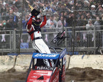 Autographed glossy photo of Kyle Larson’s 2025 Chili Bowl Nationals win, featuring his dirt sprint car and Victory Lane trophy—ideal for collectors and racing fans.