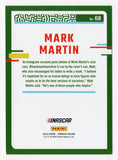Own a piece of NASCAR history with this autographed Mark Martin 2024 Donruss Racing Red Parallel card. Numbered #169/299, it is a rare and valuable addition to any collector’s set, complete with COA.