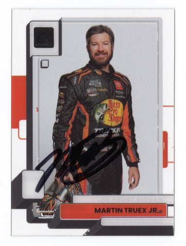 The autographed Martin Truex Jr. 2023 Panini Chronicles Clearly Donruss card, featuring a vibrant design and Truex's signature, showcasing his iconic #19 car.
