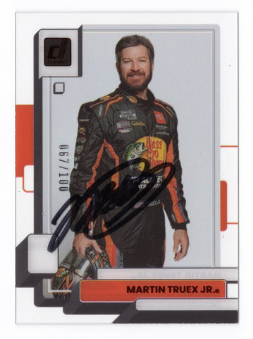 The autographed Martin Truex Jr. 2023 Panini Chronicles Clearly Donruss #067/100 Red Parallel Insert, showcasing a unique design with Truex’s signature and vibrant red accents.