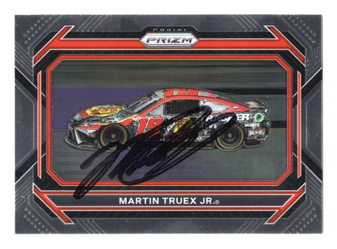 An autographed Martin Truex Jr. 2023 Panini Prizm Racing trading card featuring his signature and the #19 Bass Pro Shops car. The card is part of the 2023 Prizm Racing set and includes a Certificate of Authenticity (COA), guaranteeing its authenticity as a true collector's item.