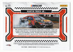 Martin Truex Jr.’s signed 2024 Donruss Racing "Burning Rubber" card with the #19 Bass Pro Shops car in a burnout moment. A rare collectible with COA.