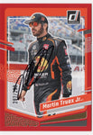 The autographed Martin Truex Jr. 2024 Donruss Racing #297/299 Red Parallel Insert card. A rare NASCAR collectible with a Certificate of Authenticity, perfect for gifting.