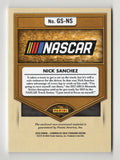 Nick Sanchez autographed 2023 Panini Gold Standard NASCAR trading card featuring a triple relic of race-used memorabilia. Includes car, tire, and sheet metal relics, with COA for guaranteed authenticity.