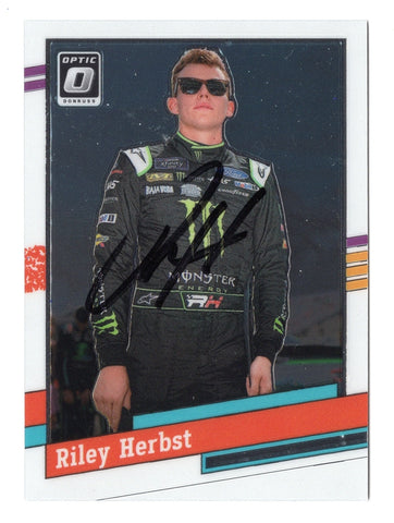 This autographed Riley Herbst 2024 Donruss Optic 1991 RETRO NASCAR card features the signature of the rising star from the Xfinity Series, making it a rare and valuable addition to any collection.