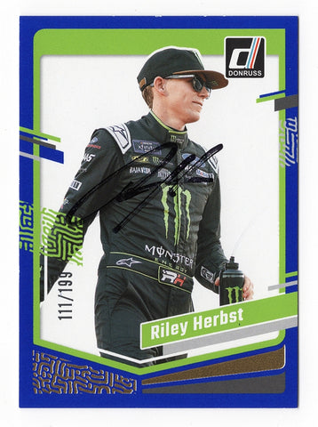 This autographed Riley Herbst 2024 Donruss Racing Blue Parallel card is numbered #111/199, making it a rare NASCAR collectible. With only 199 made, it features a bold signature from Riley Herbst and comes with a Certificate of Authenticity.