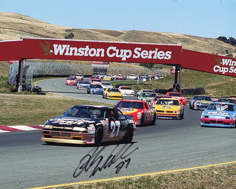 Vintage 8x10 glossy photo of Rusty Wallace driving his #27 Miller Genuine Draft car on a road course. Signature verified with Certificate of Authenticity (COA).