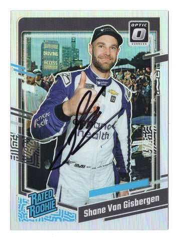 This autographed Shane Van Gisbergen 2024 Donruss Racing Rated Rookie Silver Prizm card celebrates his victory at the 2023 Chicago Street Race. With its stunning prizm finish and a Certificate of Authenticity (COA), this rare card is a must-have for NASCAR collectors and fans.