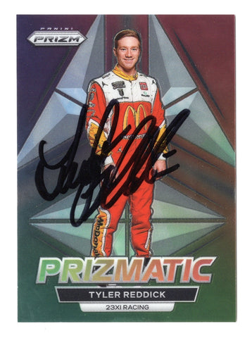 Tyler Reddick’s autograph on the 2023 Panini Prizm Racing Prismatic Rare Insert card. A stunning NASCAR collectible with vibrant prismatic colors and COA.