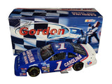 Autographed 1991 Jeff Gordon #1 Carolina Ford Dealers Busch Series 1/24 scale NASCAR diecast featuring an authentic Jeff Gordon signature and detailed early-career racing graphics. This vintage-style collectible celebrates Gordon's racing history before his famous No. 24 years and makes a great gift for NASCAR fans.