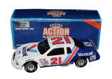 Autographed 1995 Buddy Baker #21 Valvoline Racing vintage Action black window bank 1/24 scale NASCAR diecast car featuring authentic signature, detailed sponsor graphics, and collectible appeal for motorsports enthusiasts and racing memorabilia collectors.