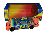 Autographed 1995 Jeff Gordon #24 DuPont Rainbow Signature Series Racing Champions 1/24 scale NASCAR diecast car featuring authentic signature, vibrant Rainbow Warrior graphics, and strong appeal among collectors of vintage Jeff Gordon memorabilia.