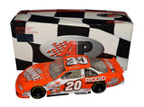 Autographed 1999 Tony Stewart #20 The Home Depot Rookie Car Action 1/24 scale NASCAR diecast featuring an authentic Tony Stewart signature and the iconic orange Home Depot racing scheme. This vintage rookie-season collectible makes a great gift for Tony Stewart fans and dedicated NASCAR memorabilia collectors.