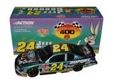 Autographed 2001 Jeff Gordon #24 Looney Tunes Racing Bugs Bunny black window bank Action 1/24 scale NASCAR diecast car featuring authentic signature, colorful character graphics, and collectible appeal for racing enthusiasts.