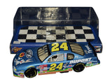 Autographed 2001 Jeff Gordon #24 Looney Tunes Racing Monte Carlo 400 Winner's Circle 1/24 scale NASCAR diecast car featuring authentic signature, colorful character graphics, and strong collector appeal for racing memorabilia enthusiasts.