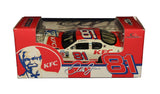 Autographed 2004 Dale Earnhardt Jr. #81 Kentucky Fried Chicken KFC Action 1/64 scale NASCAR diecast featuring the distinctive KFC racing paint scheme and Dale Jr.’s signature. This signed collectible includes a Certificate of Authenticity and makes an excellent display piece for NASCAR racing memorabilia collectors.