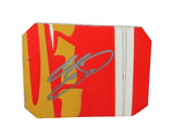 Autographed 2013 Chase Elliott #9 Aaron’s Rookie ARCA Series red and orange race-used NASCAR sheet metal. This hand-signed collectible is roughly the size of a standard trading card, fits inside a plastic toploader for protection and display, and includes a certificate of authenticity.