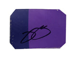 Autographed 2019 Jimmie Johnson #48 Ally Racing two-color purple race-used NASCAR sheet metal from Hendrick Motorsports. This signed collectible is roughly the size of a standard trading card, fits inside a plastic toploader for protection and display, and includes a certificate of authenticity.