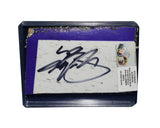 Autographed 2019 Kyle Busch #18 M&M’s Halloween Martinsville race-used NASCAR composite sheet metal featuring authentic race wear, colorful Halloween graphics, and included COA. Roughly trading card sized and protected inside a plastic toploader for easy display and collectible preservation.