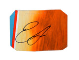 Autographed 2021 Erik Jones #43 Columbia race-used NASCAR sheet metal from his Daytona car. This hand-signed collectible is roughly the size of a standard trading card, fits inside a plastic toploader for protection and convenient display, and includes a certificate of authenticity.