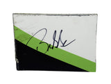 Autographed 2023 Bubba Wallace #23 DraftKings Racing race-used composite NASCAR sheet metal from the Crayon 301 at Loudon. This hand-signed collectible is roughly the size of a standard trading card, fits inside a plastic toploader for protection and display, and includes a certificate of authenticity.