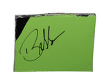 Autographed 2023 Bubba Wallace #23 DraftKings Racing race-used composite NASCAR sheet metal from his Loudon car. This hand-signed collectible is roughly the size of a standard trading card, fits inside a plastic toploader for protection and display, and includes a certificate of authenticity.