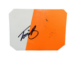 Autographed 2025 Toni Breidinger #5 Celsius NASCAR Craftsman Truck Series race-used sheet metal from her Charlotte truck. This signed collectible is roughly the size of a standard trading card, fits inside a plastic toploader for protection and display, and includes a certificate of authenticity.