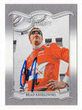 Brad Keselowski is featured on this autographed 2023 Panini Chronicles Racing Donruss Classics NASCAR trading card. Showcasing the recognizable Donruss Classics design and Keselowski's signature, this collectible includes a Certificate of Authenticity and celebrates the 2012 NASCAR Cup Series champion and RFK Racing driver and co-owner.