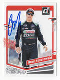 Autographed Brad Keselowski 2024 Donruss Racing NASCAR trading card featuring the 2012 NASCAR Cup Series champion and recognizable Donruss card design. Personally signed by Keselowski and accompanied by a Certificate of Authenticity, this collectible celebrates the accomplished RFK Racing No. 6 Ford driver and team co-owner.