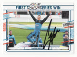 Autographed Carson Hocevar 2024 Donruss Racing trading card commemorating his first Truck Series victory at Texas, featuring modern design, detailed race imagery, and clear signature, ideal for collectors seeking a milestone moment from a rising NASCAR driver.