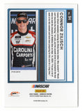 Connor Zilisch autographed 2025 Donruss Optic Racing Rated Rookie Silver Prizm NASCAR trading card with Certificate of Authenticity. Featuring the signature of the talented young driver, this collectible rookie card combines NASCAR memorabilia, Panini Donruss Optic styling, and a distinctive silver parallel for racing autograph collectors.