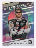 Autographed Dale Earnhardt Jr. 2021 Donruss Racing Retro Series NASCAR trading card featuring the vintage-inspired Retro Series insert design. Individually serial numbered #124/199, this signed collectible includes a Certificate of Authenticity and celebrates the legendary two-time Daytona 500 champion and longtime NASCAR fan favorite.